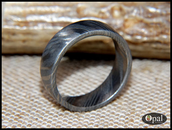 Hand forged damascus steel ring
