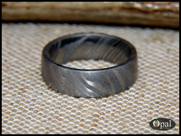 Hand forged damascus steel ring